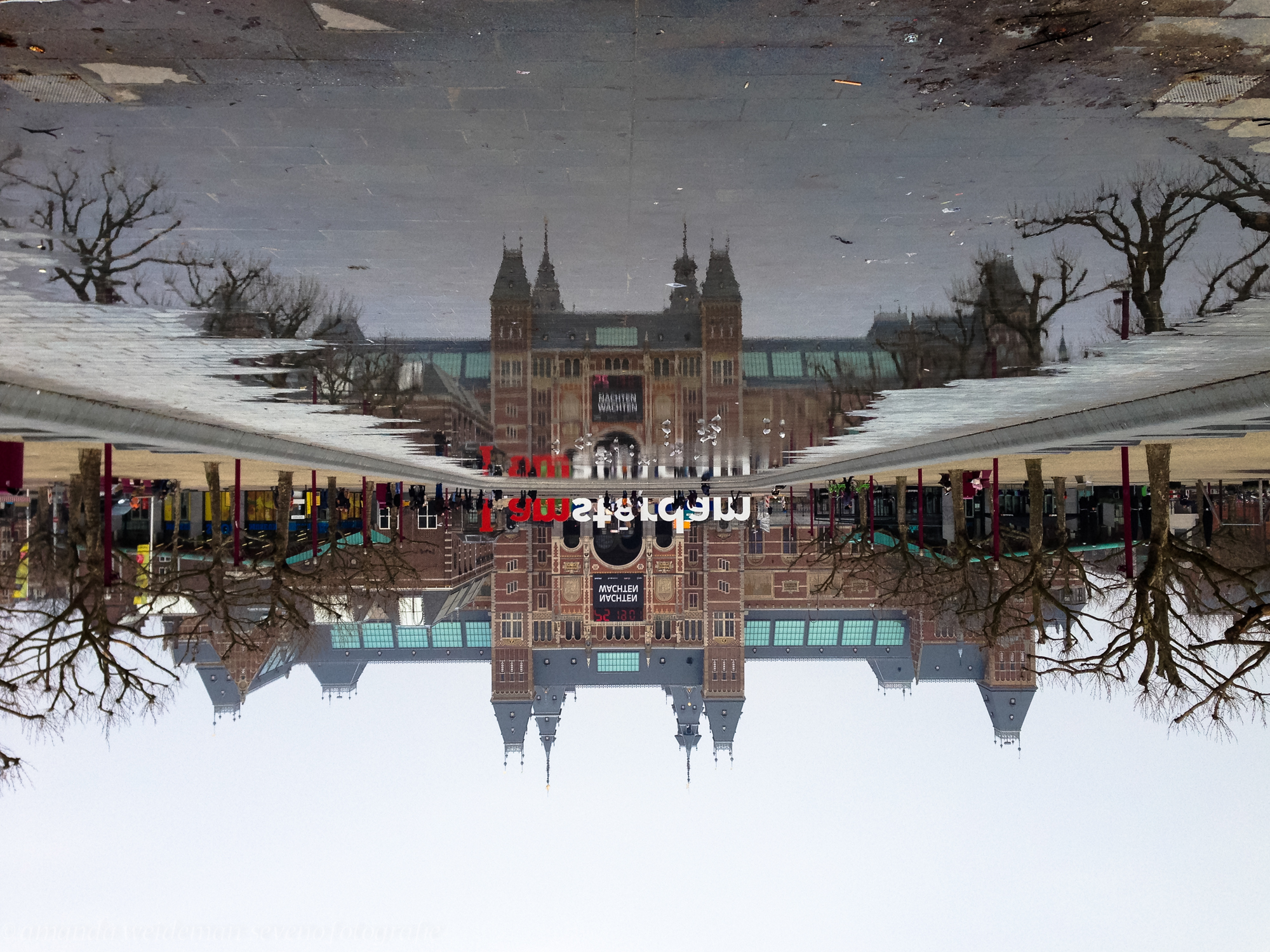 reflections-of-the-rijksmuseum-in-amsterdam