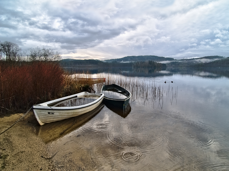 en-toenopeenshield-de-regen-op