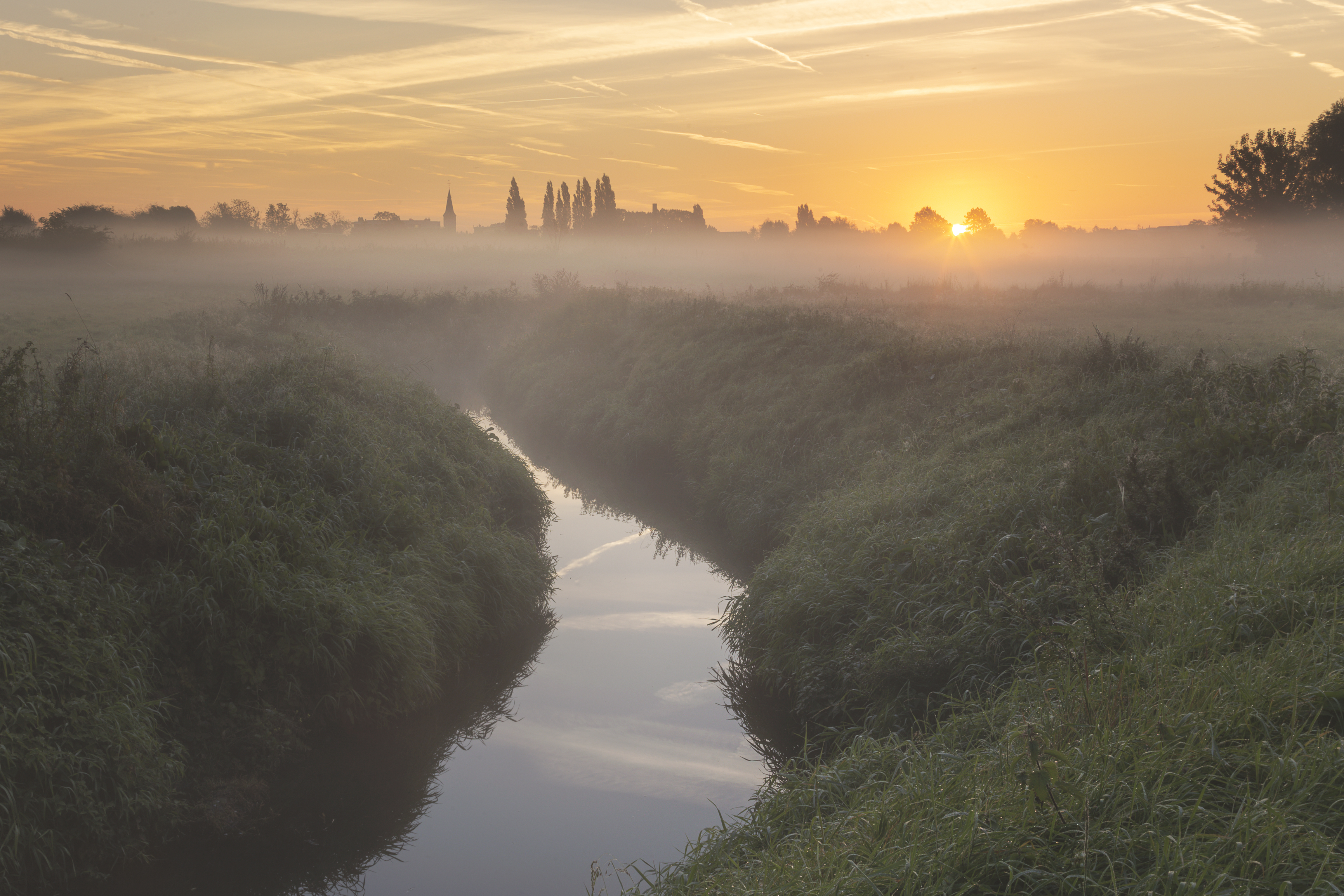 zonsopkomst-boven-de-vlaamse-velden