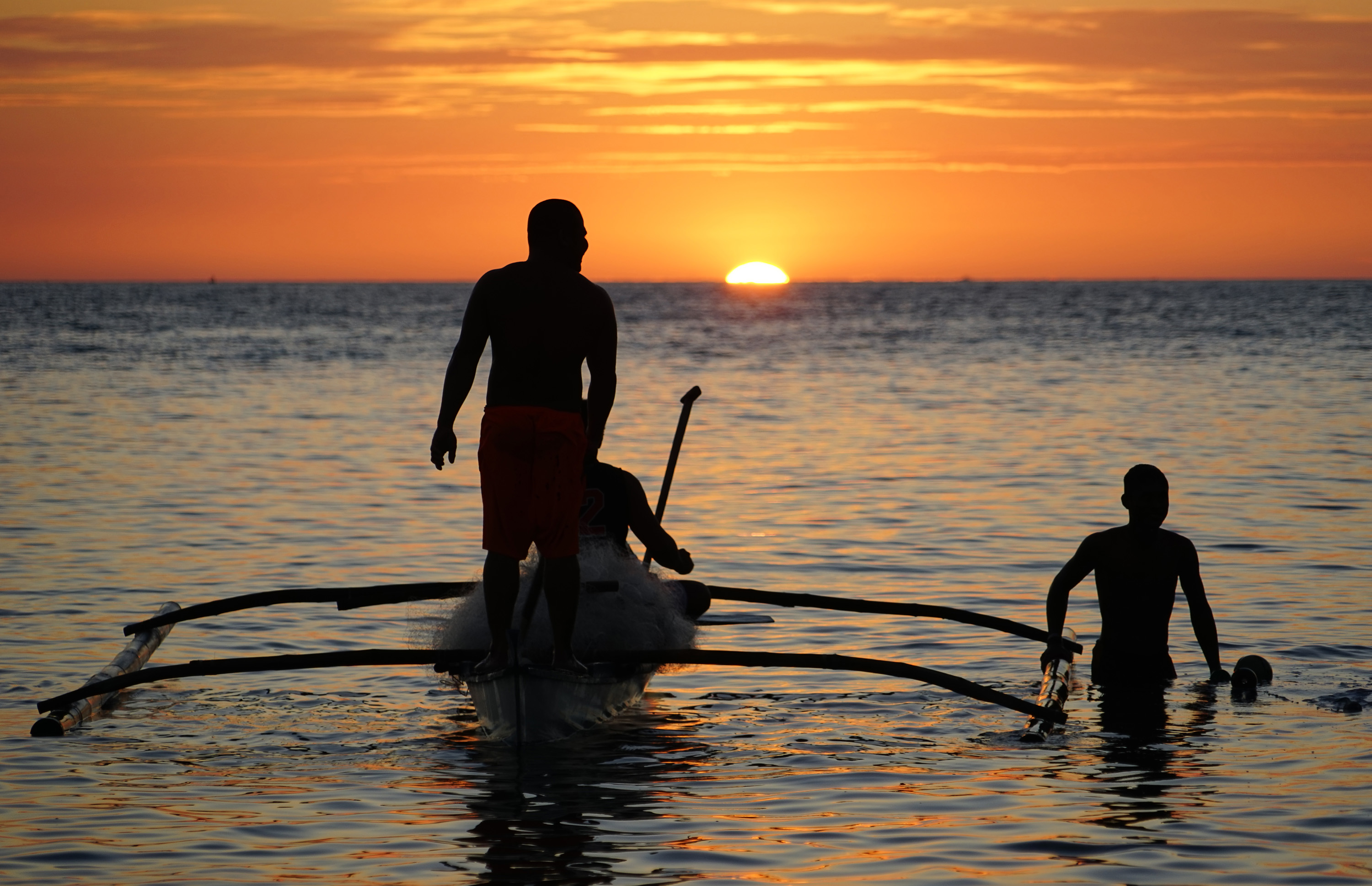 vissers-bij-zonsondergang