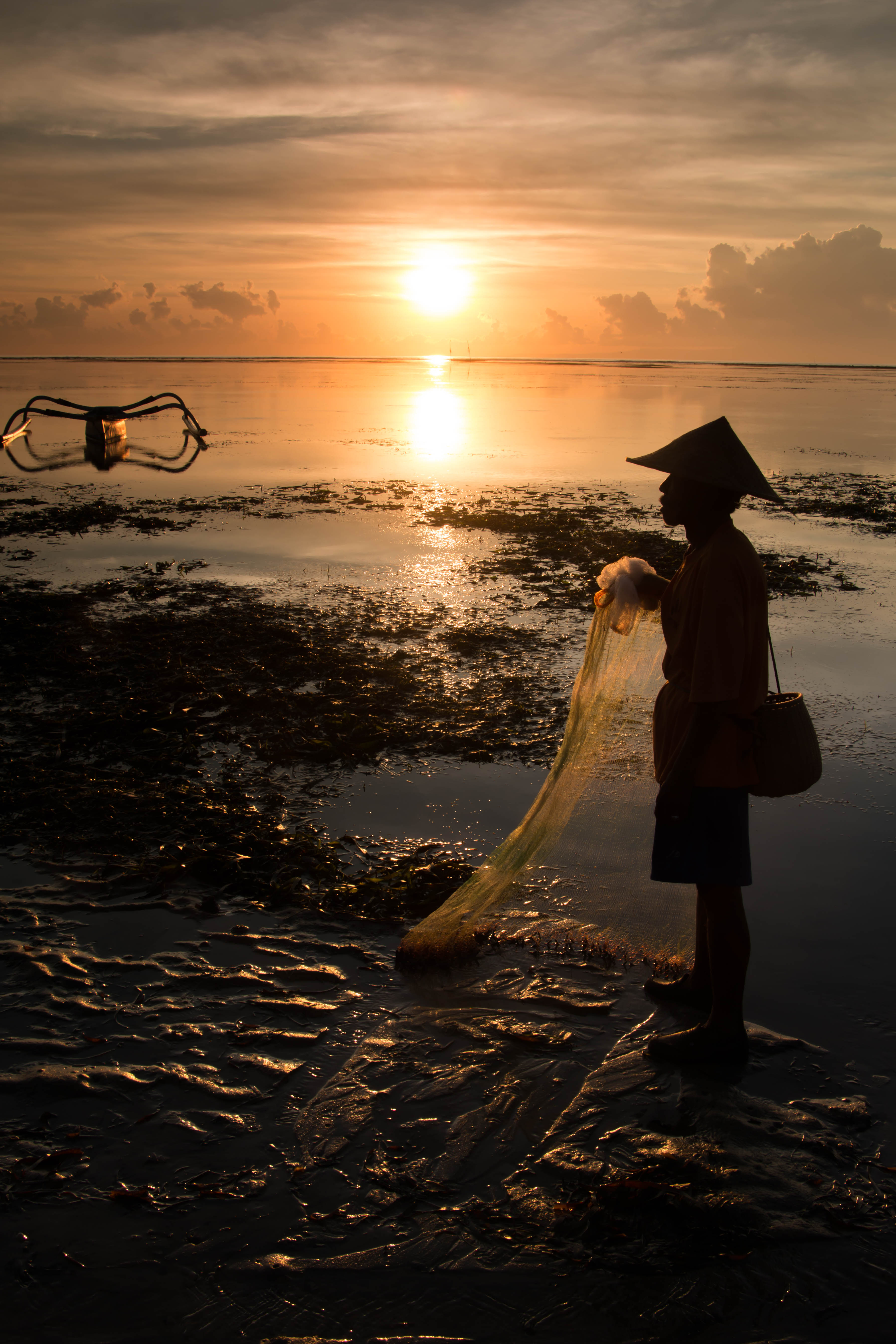 asian-fisherman-at-sunrise