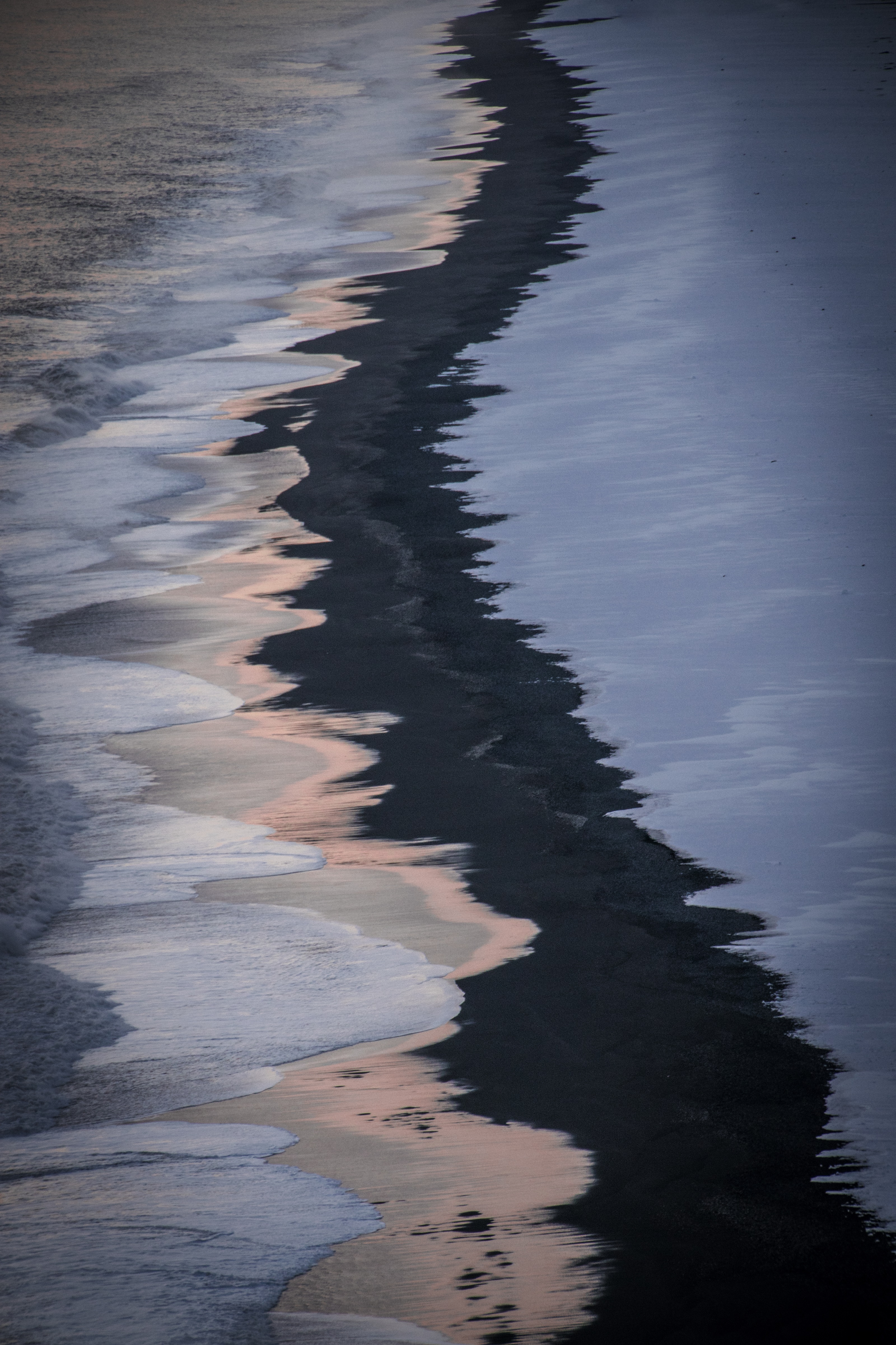 black-sand-white-snow