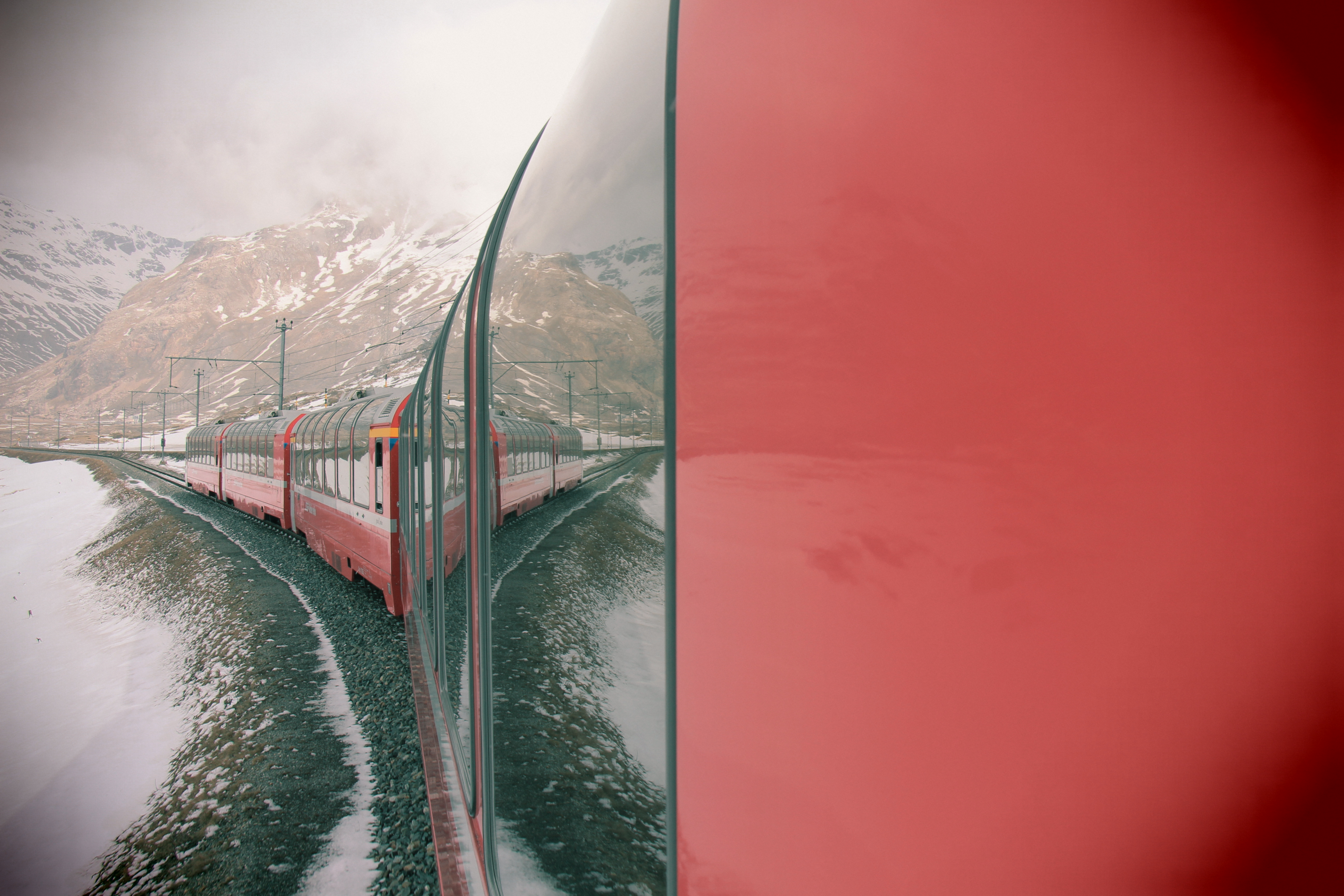 the-red-bernina-express-in-a-white-decor